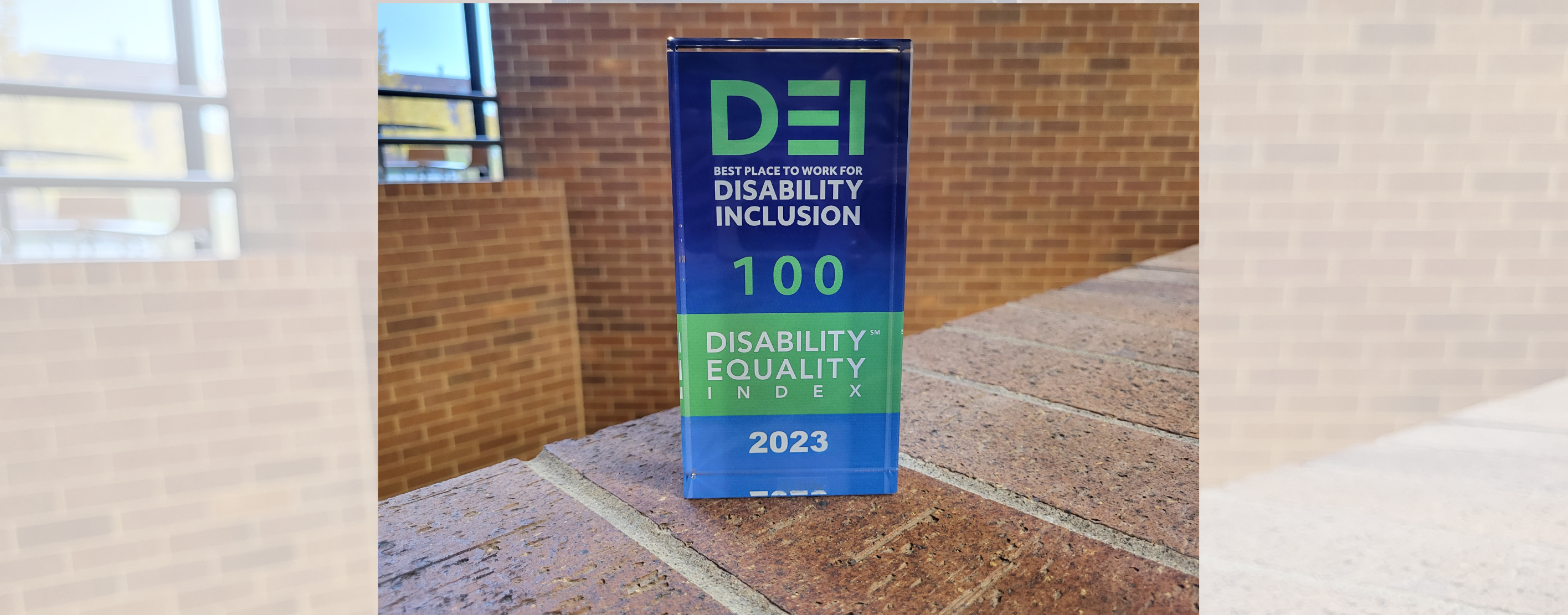 A picture of an award that says "2023 DEI Best Place to Work for Disability Inclusion 100 Disability Quality Index 2023"
