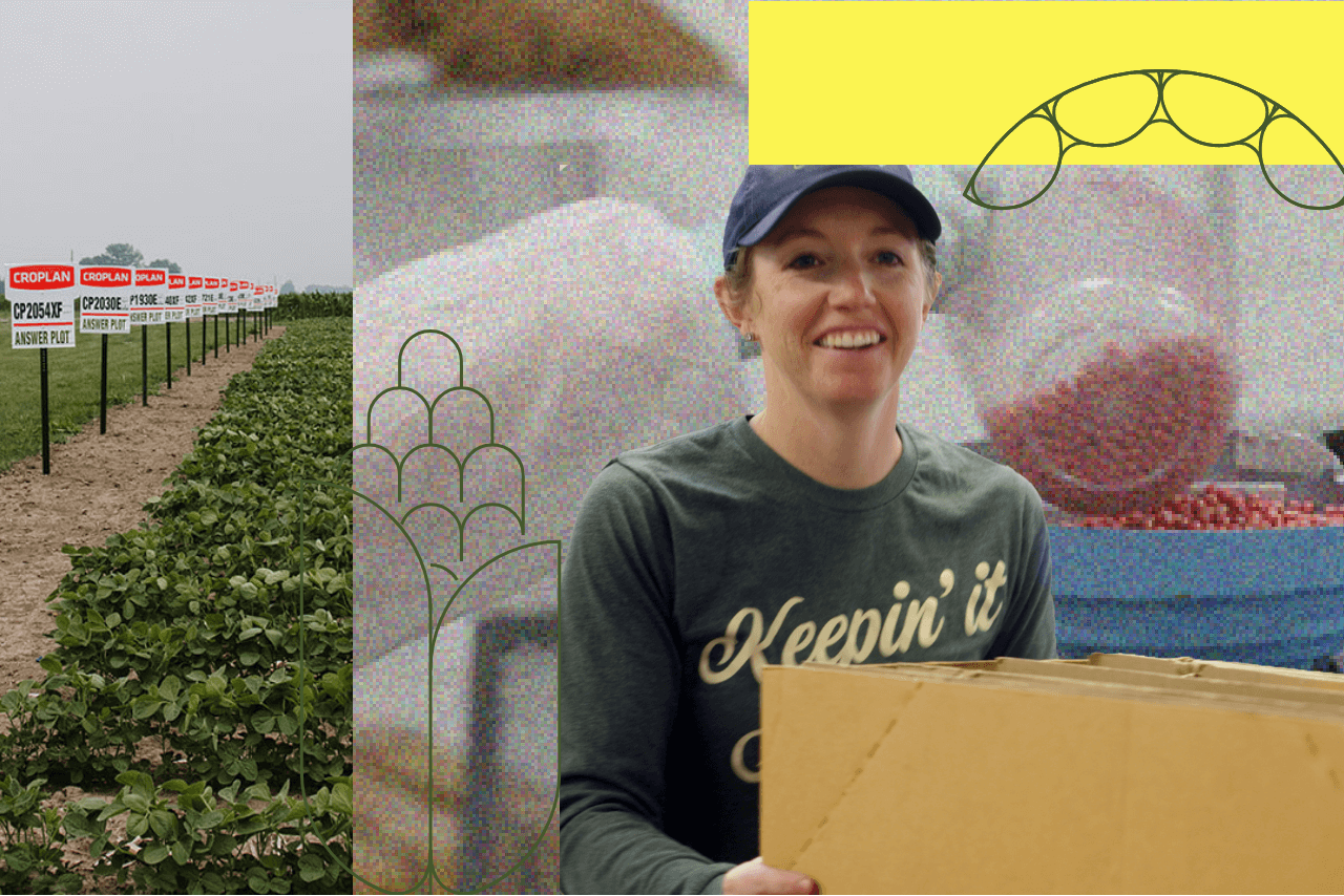 A woman with a green shirt and green hat holds a box