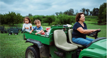 lady-on-tractor.png